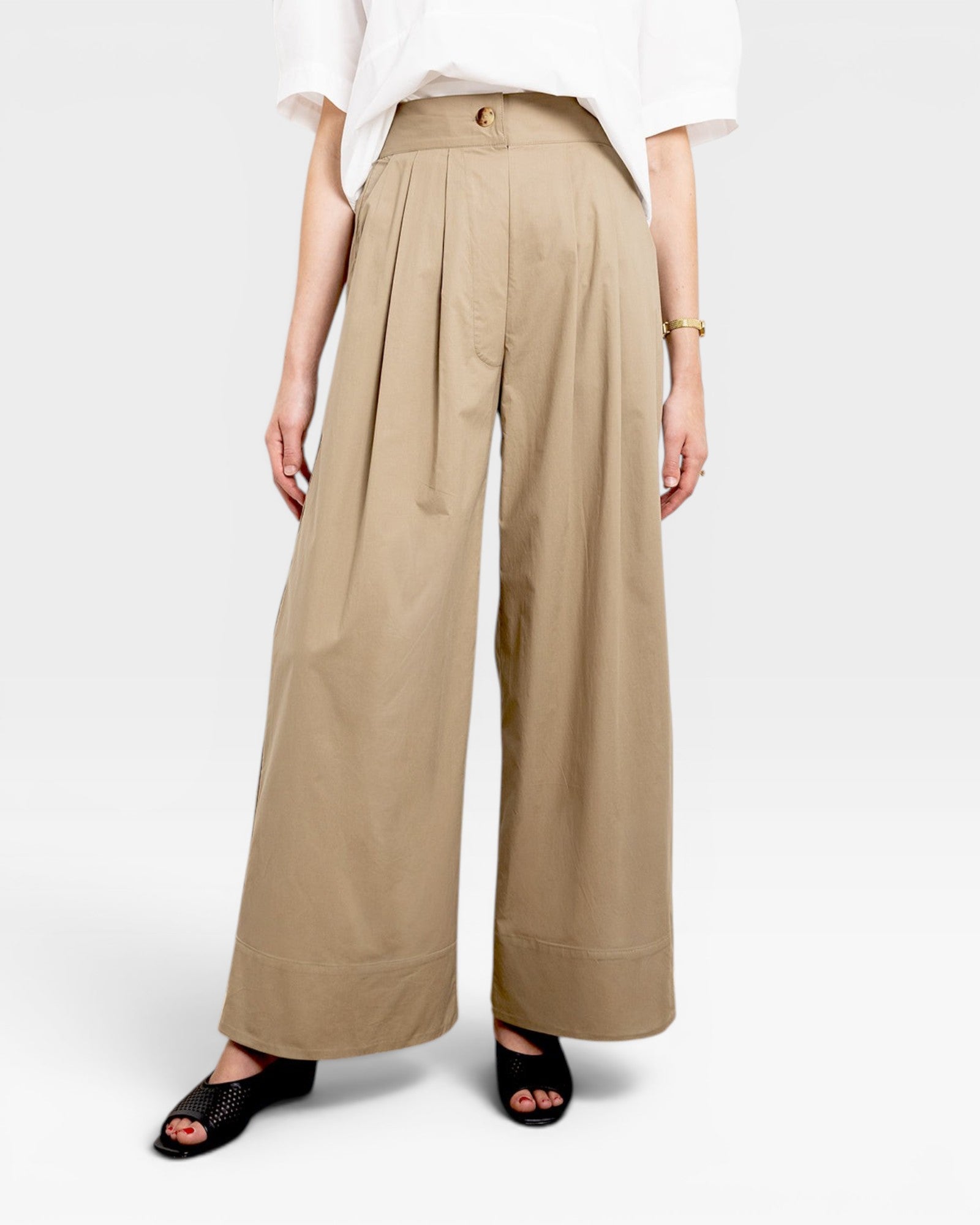 JONES + CO Khaki Organic Crisp cotton wide-leg pleated high-waisted trousers with elastic back waistband and faux button fly.