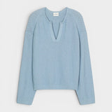 JONES + CO dove blue organic cotton knitted jersey with 3D effect stripe pattern and V-neck.