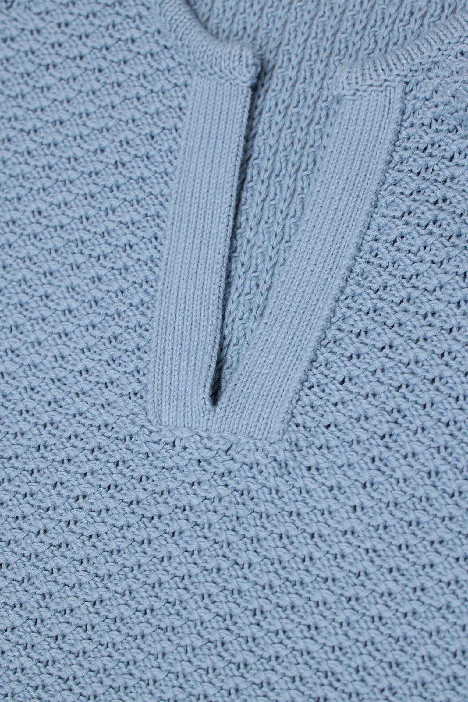 JONES + CO dove blue organic cotton knitted jersey with 3D effect stripe pattern and V-neck.
