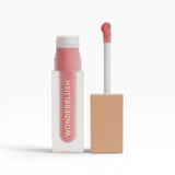 JONES + CO La Laque Tinted Lip Oil in a sheer pink shade, with a frosted glass bottle and gold lettering.