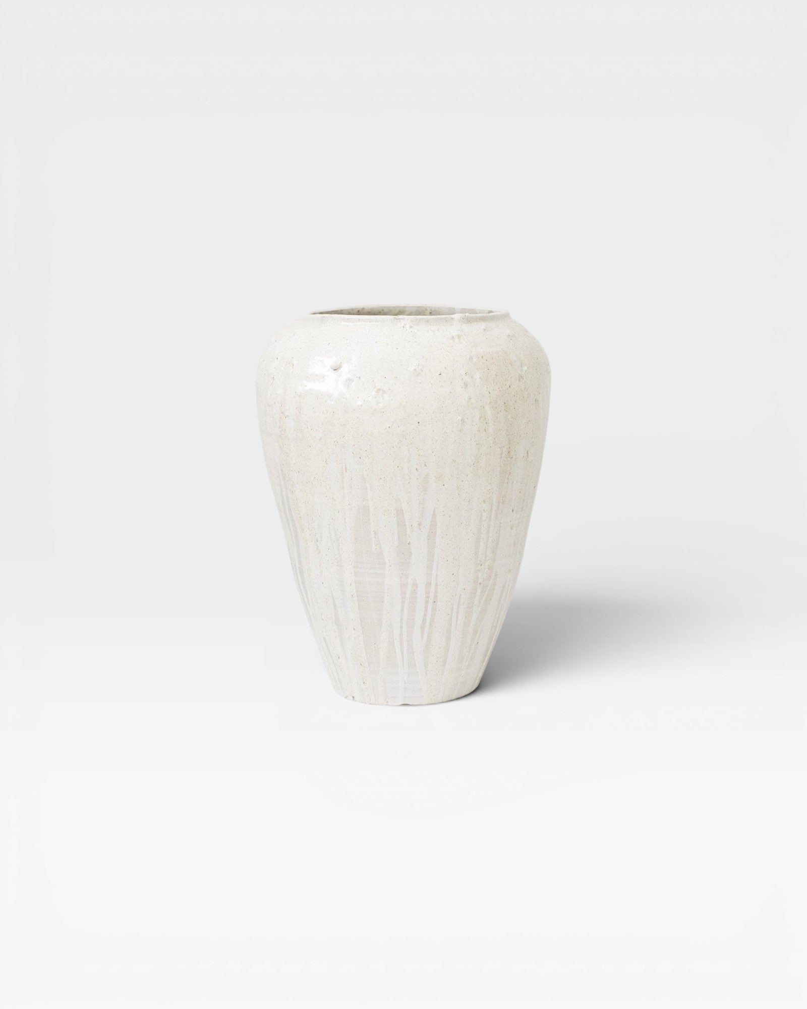 JONES + CO large handthrown ceramic vase with unique ash glaze, off-white with natural variations.