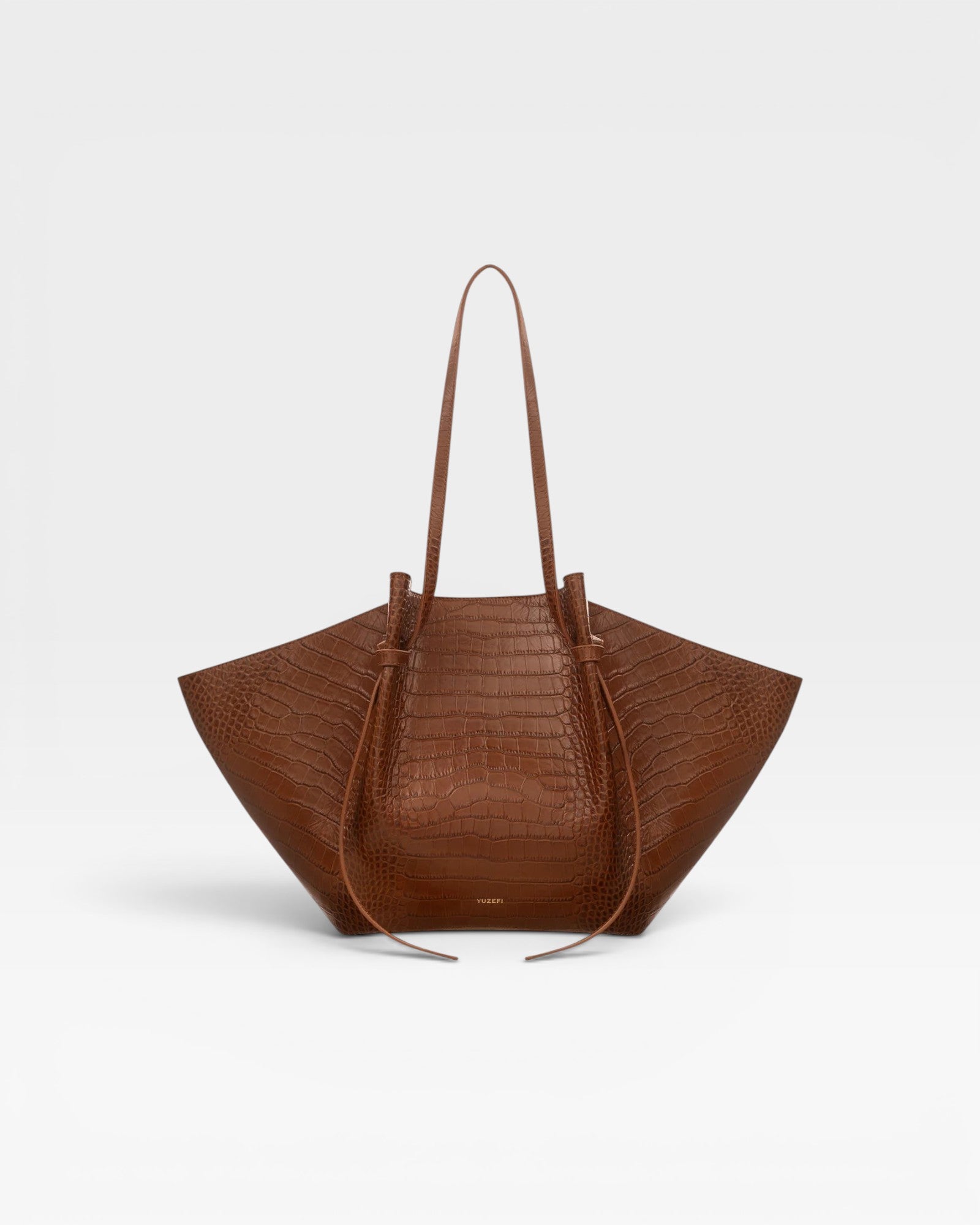 JONES + CO Large Mochi tote bag in brown embossed sierra leather with organic curves and knot details.