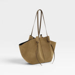 JONES + CO Large Mochi tote bag in fennel suede with organic curves, folds, and long shoulder straps.