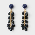 JONES + CO Laurel drop earrings featuring layered black acrylic beads suspended from delicate gold-tone chains.