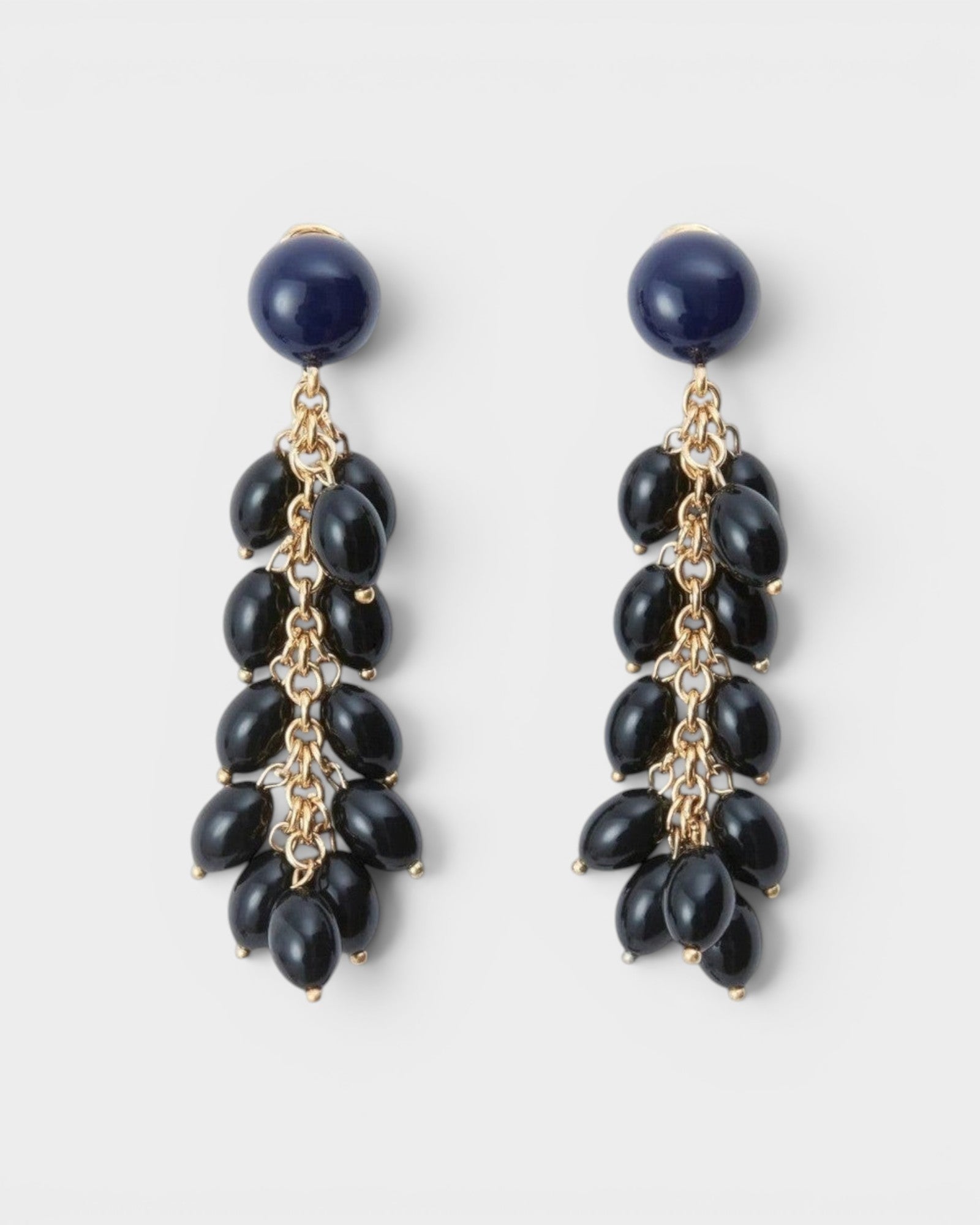 JONES + CO Laurel drop earrings featuring layered black acrylic beads suspended from delicate gold-tone chains.