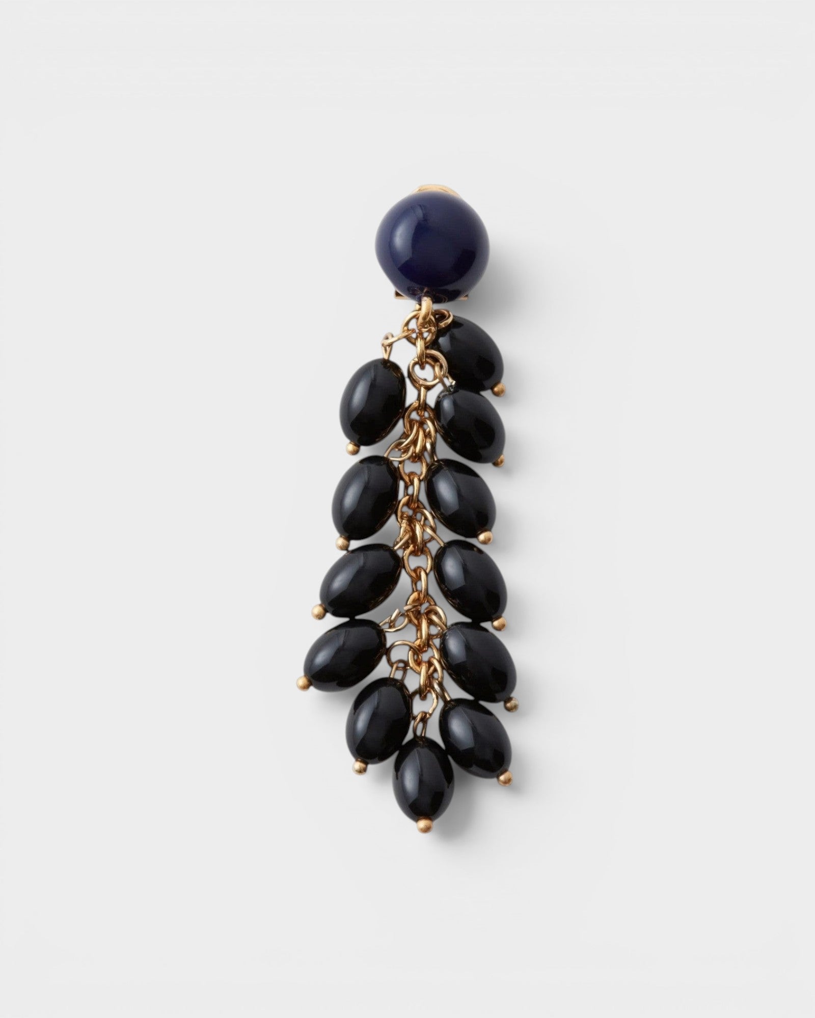 JONES + CO Laurel drop earrings featuring layered black acrylic beads hanging from delicate gold-tone chains.