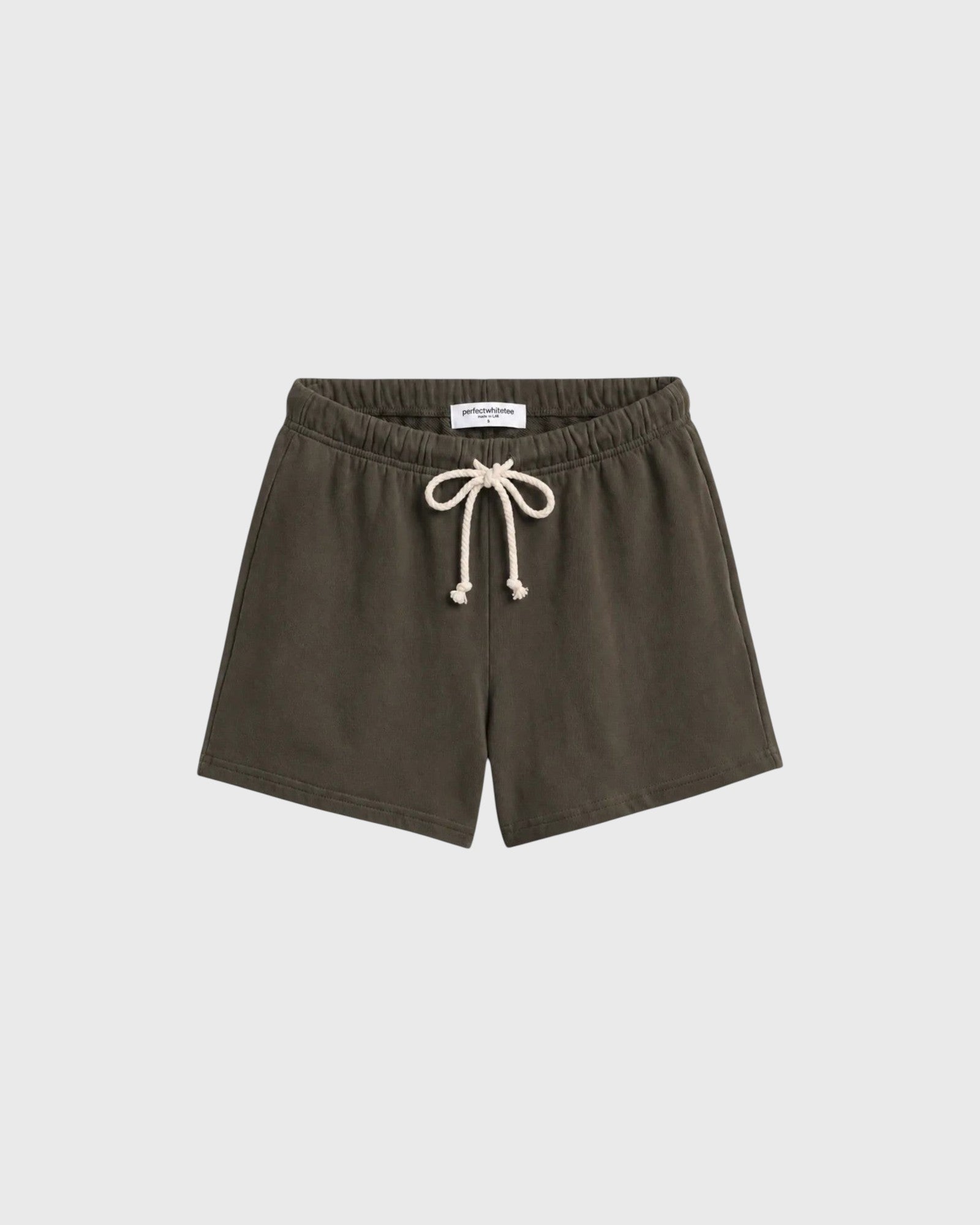 JONES + CO Layla dark olive French terry lounge shorts with an elastic waistband, natural drawcord, and raw edge hem.