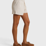 JONES + CO Layla French Terry sweat shorts in whitecap grey with a raw hem and natural drawcord, side view.