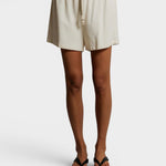 JONES + CO Layla bright ivory French terry lounge shorts with an elastic waistband, drawcord, and raw edge hem.