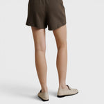 JONES + CO Layla dark olive French terry lounge shorts with elastic waistband and raw edge hem, back view