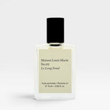 JONES + CO No.02 Le Long Fond perfume oil in a clear glass bottle with a black cap. Notes of hinoki wood, cedarwood, patchouli, and musk.
