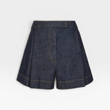 JONES + CO high-waisted Leo denim shorts in raw wash with pleated front and contrast stitching.