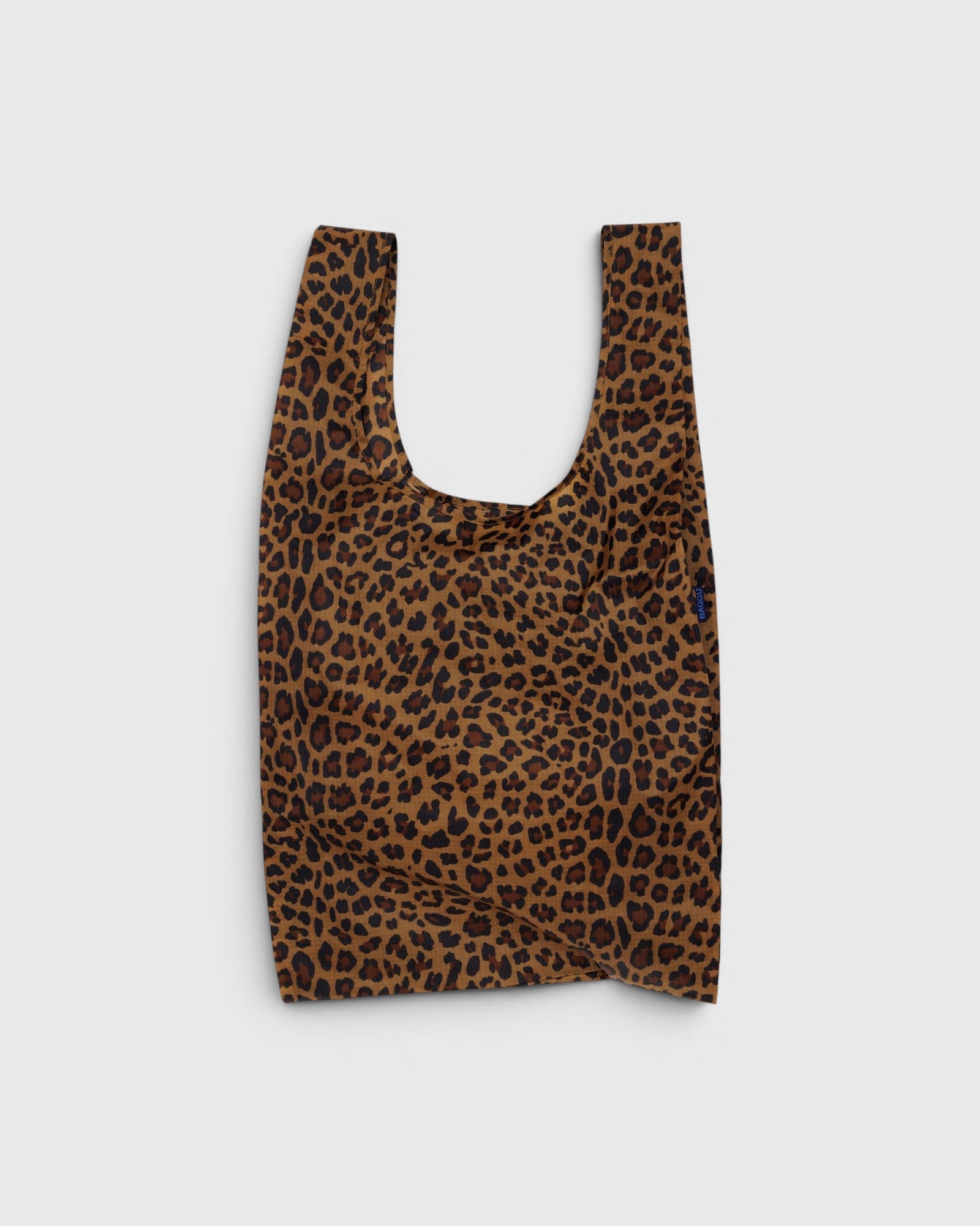 JONES + CO Big Baggu reusable tote bag in a brown and black leopard print pattern for groceries or travel.