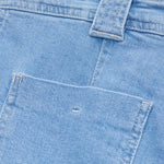 JONES + CO light blue flared jeans featuring a patch pocket, wide belt loop, and light contrast stitching.