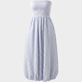 JONES + CO Lunaire midi dress in light blue striped cotton with a strapless shirred bodice and bubble hem silhouette.