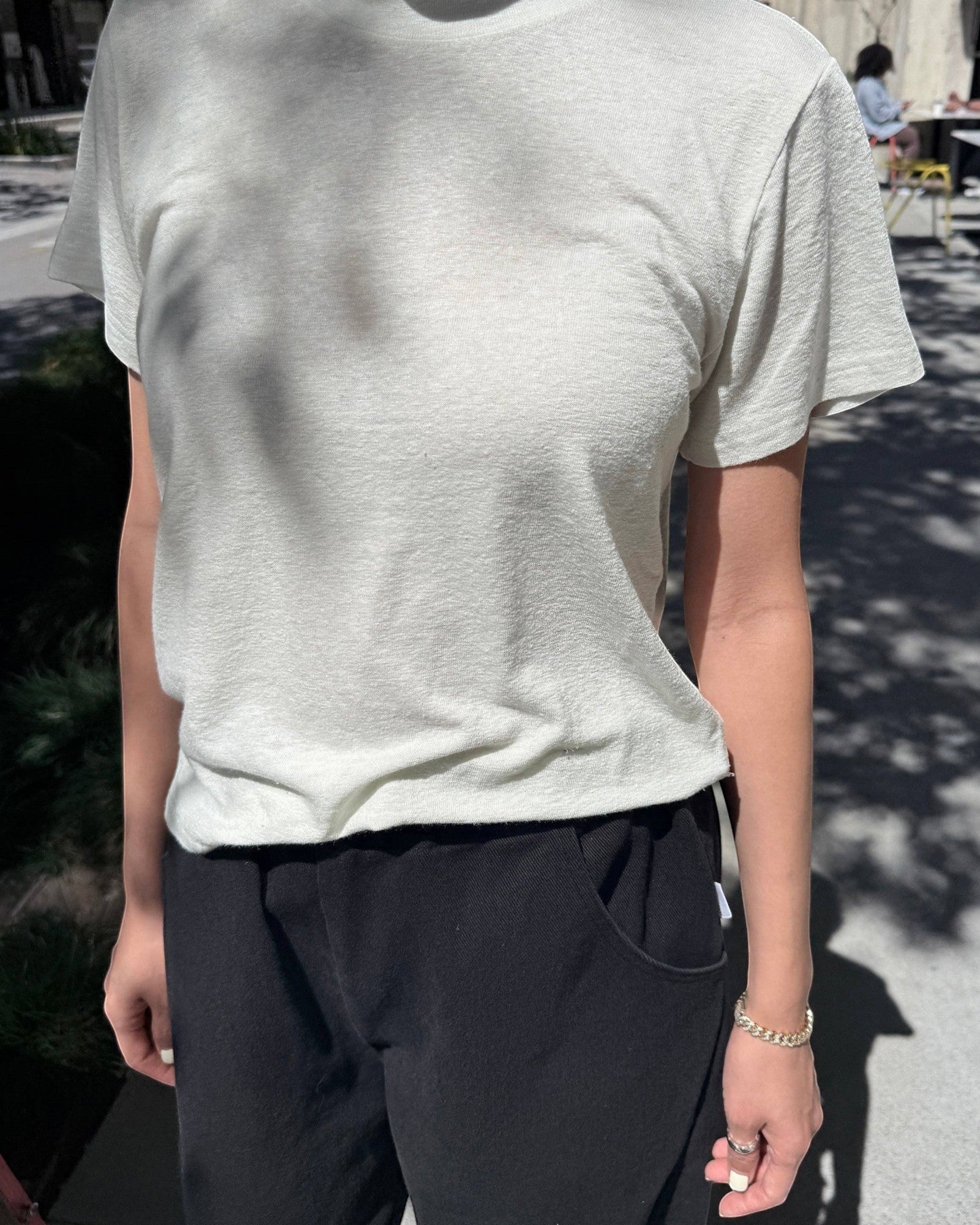 JONES + CO Bo Linen Blend Tee in Salt. Relaxed fit, crew neck, short sleeves, textured, sheer fabric.