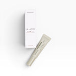 JONES + CO white box and light beige lip care tube with text "∞ LAYERS LIP CARE SOIN POUR LES LEVRES"