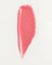 JONES + CO La Laque Tinted Lip Oil swatch in a sheer coral-pink shade. Lightweight, glossy finish.