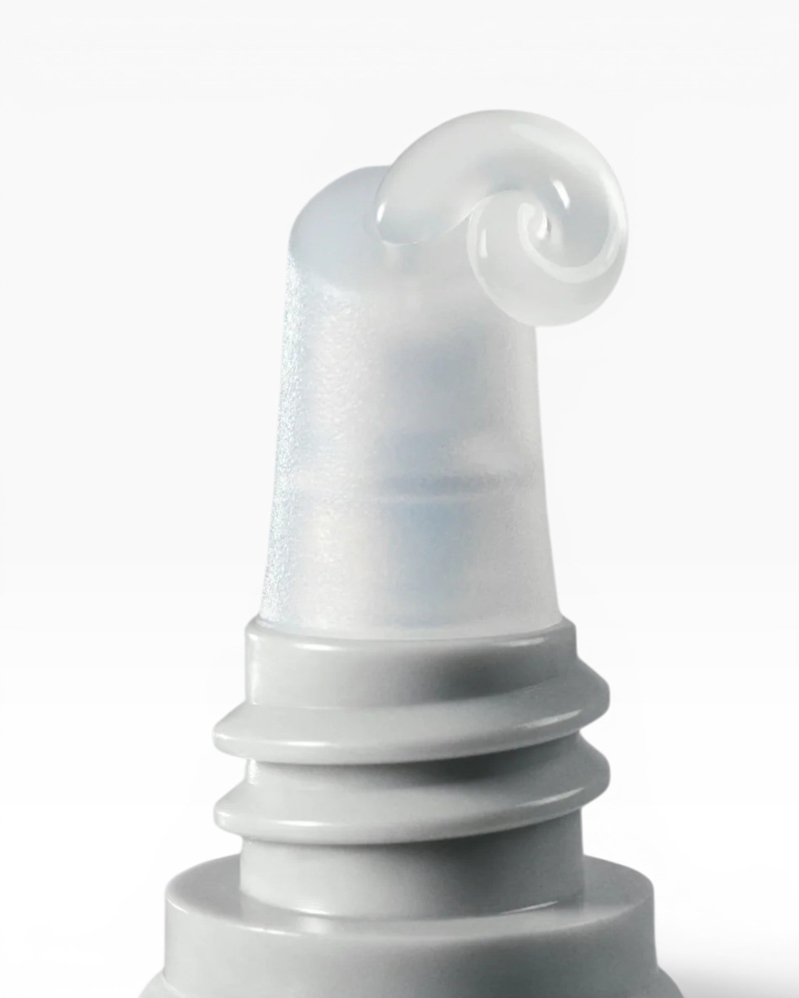 JONES + CO clear lip treatment serum with a unique swirl applicator tip, providing dewy moisture.