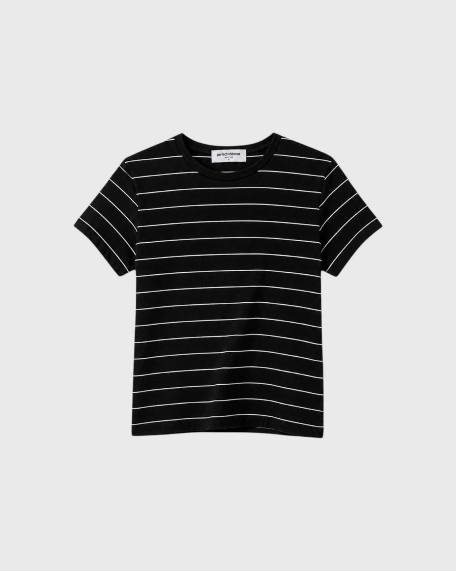 JONES + CO Lisa Tee in black with white horizontal stripes, crafted from soft recycled cotton with a crew neckline.