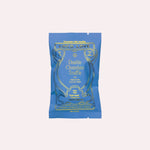 JONES + CO Loco Love Double Chocolate Truffle bar in a bright blue wrapper with gold foil lettering and details.