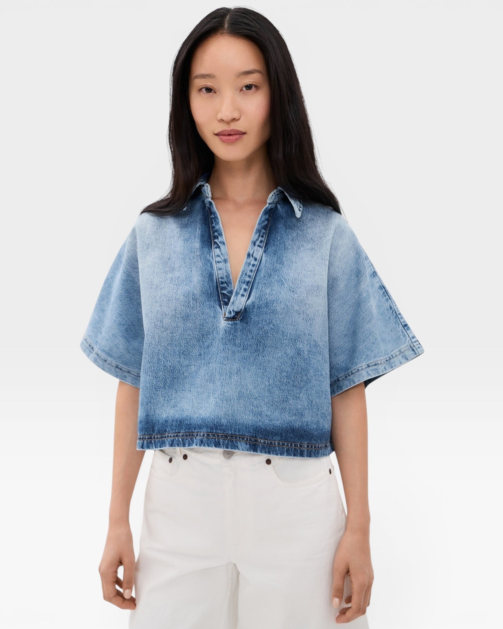JONES + CO blue washed denim Lotus shirt with open collar and dolman sleeves