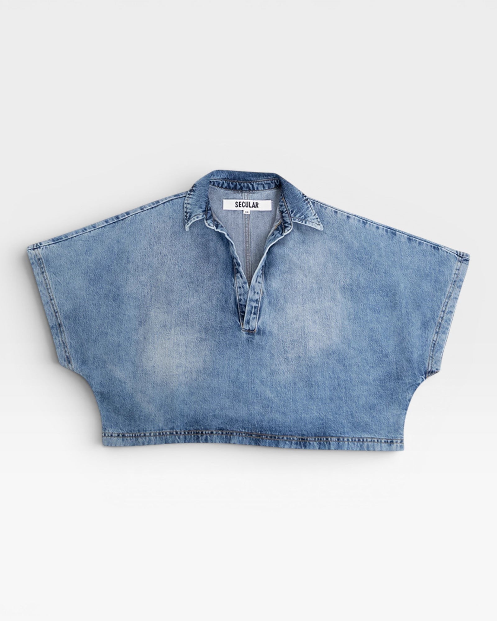 JONES + CO light wash denim Lotus shirt with open collar and wide dolman sleeves