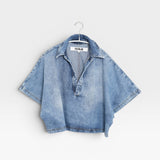 JONES + CO Lotus shirt in Malibu Wash light blue denim. Relaxed fit, cropped, open collar, wide dolman sleeves.