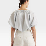 JONES + CO light blue gathered cuff Lotus top with French knot embroidery and drawstring waist