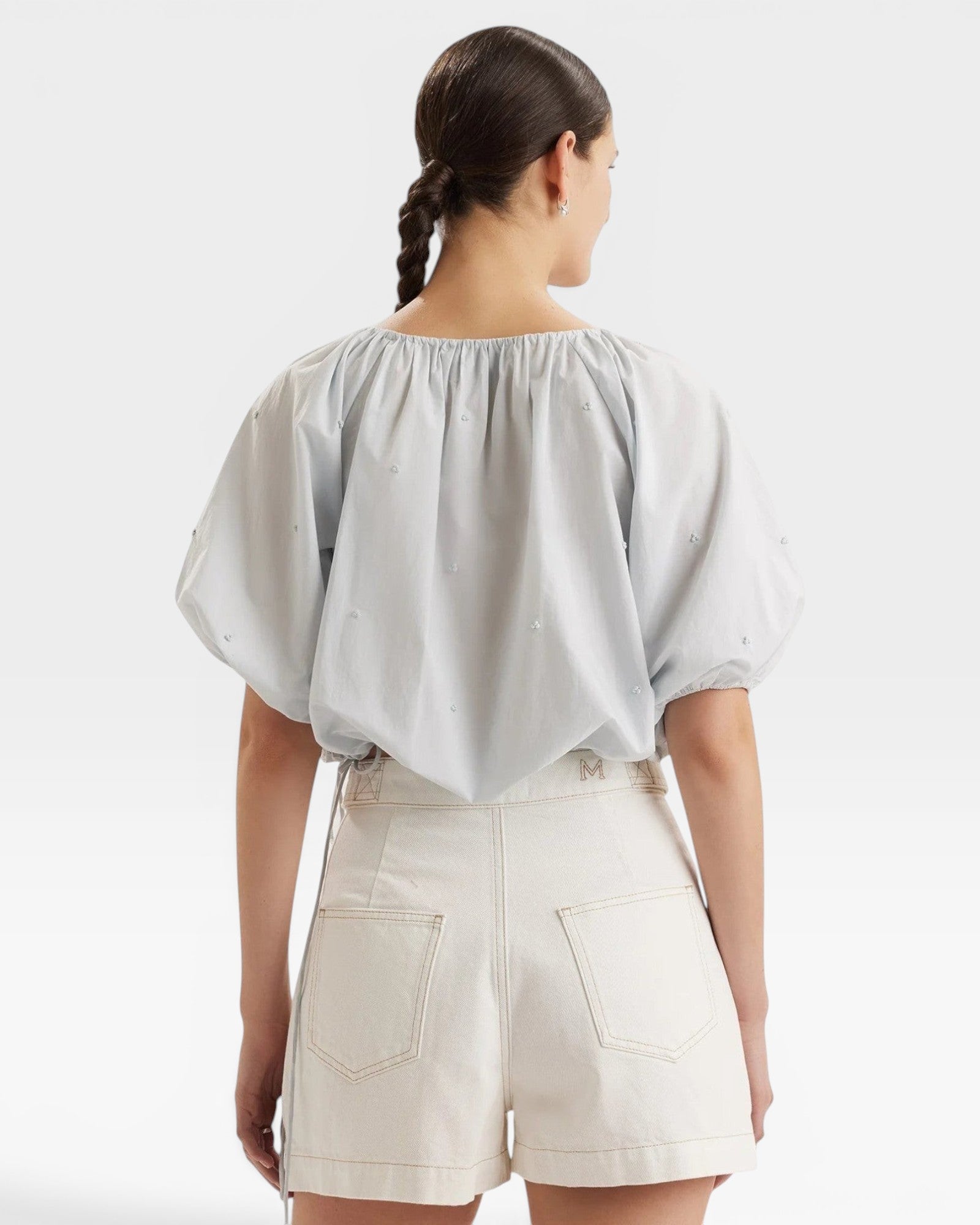 JONES + CO light blue gathered cuff Lotus top with French knot embroidery and drawstring waist