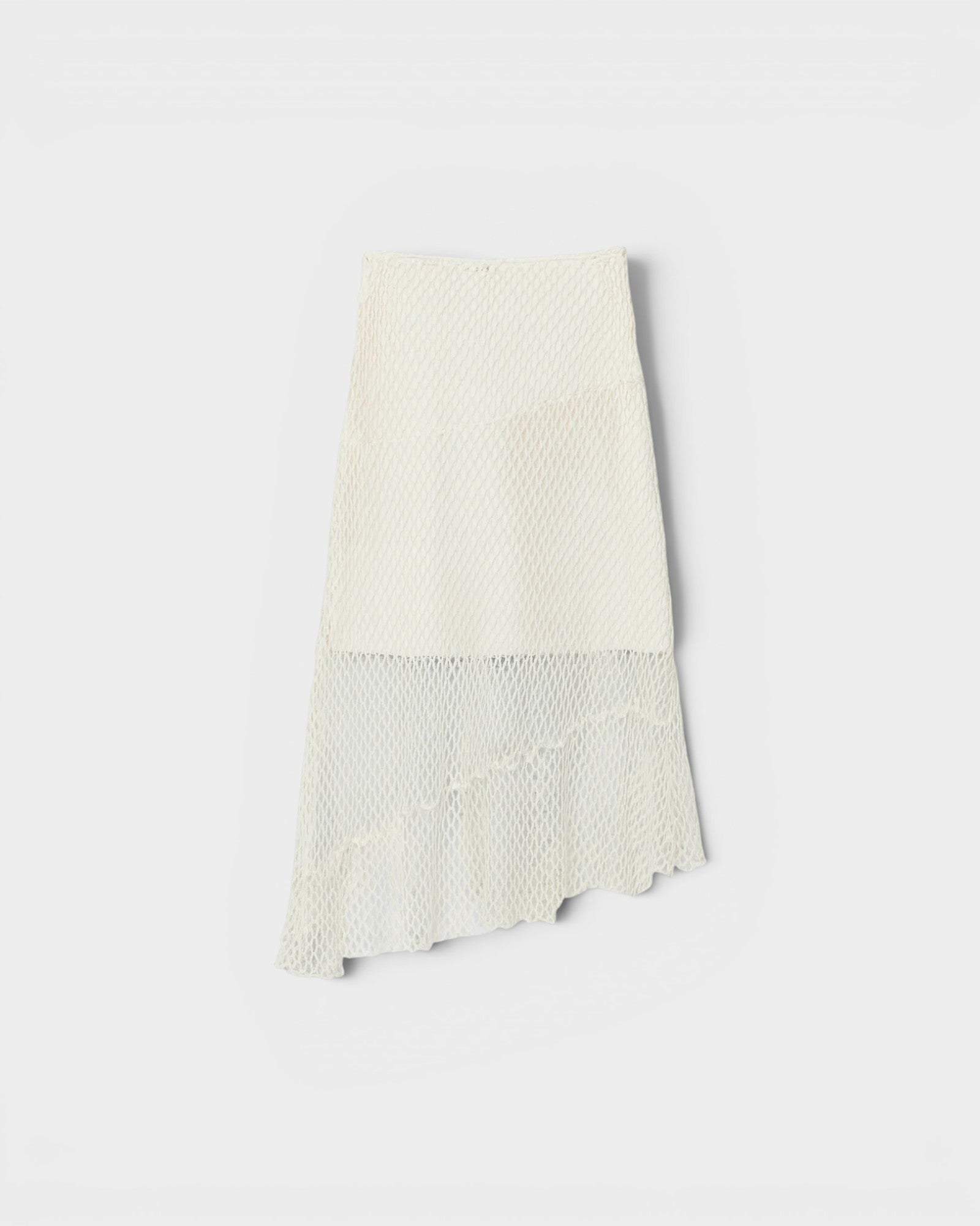 JONES + CO Louis Crochet Skirt in coconut white. Asymmetrical hem with crochet detailing.
