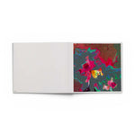 JONES + CO art book Lucas Samaras Flowers open to a page showing a psychedelic digital floral distortion.