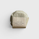 JONES + CO lülala Bergamot + Pink Pepper soap bar wrapped in sustainable brown paper packaging.