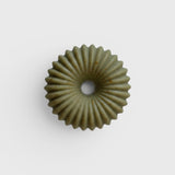 JONES + CO lülala soap bar in a sage green, fluted donut shape with organic texture and a central hole.