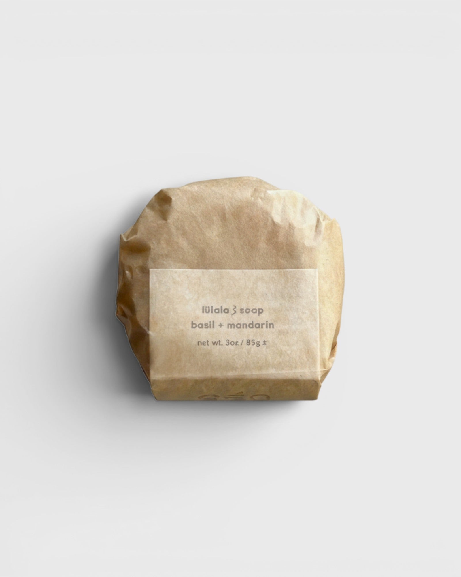 JONES + CO lülala basil and mandarin soap bar wrapped in sustainable brown paper packaging