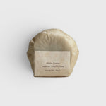 JONES + CO lülala soap bar wrapped in minimalist brown paper with a label featuring vetiver and makrut lime scent.
