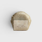 JONES + CO lülala soap bar wrapped in minimalist brown paper with a label featuring vetiver and makrut lime scent.