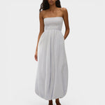 JONES + CO Lunaire midi dress in light blue striped cotton with a strapless shirred bodice and bubble-style hem.