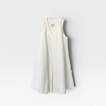 JONES + CO Mable white denim sleeveless A-line dress with V-neck and inverted box pleats.