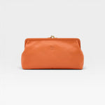 JONES + CO Manuela Classic Clutch in orange vegetable-tanned cowhide leather with vintage clasp and embossed logo.