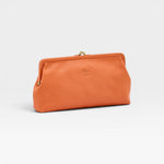 JONES + CO Manuela Classic Clutch in orange vegetable-tanned cowhide leather with vintage clasp and embossed logo.