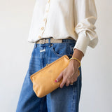 JONES + CO Manuela Classic Clutch in natural vegetable-tanned cowhide leather with vintage clasp.