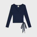 JONES + CO Margot wrap top in midnight blue ribbed knit with a V-neckline and side tie closure.