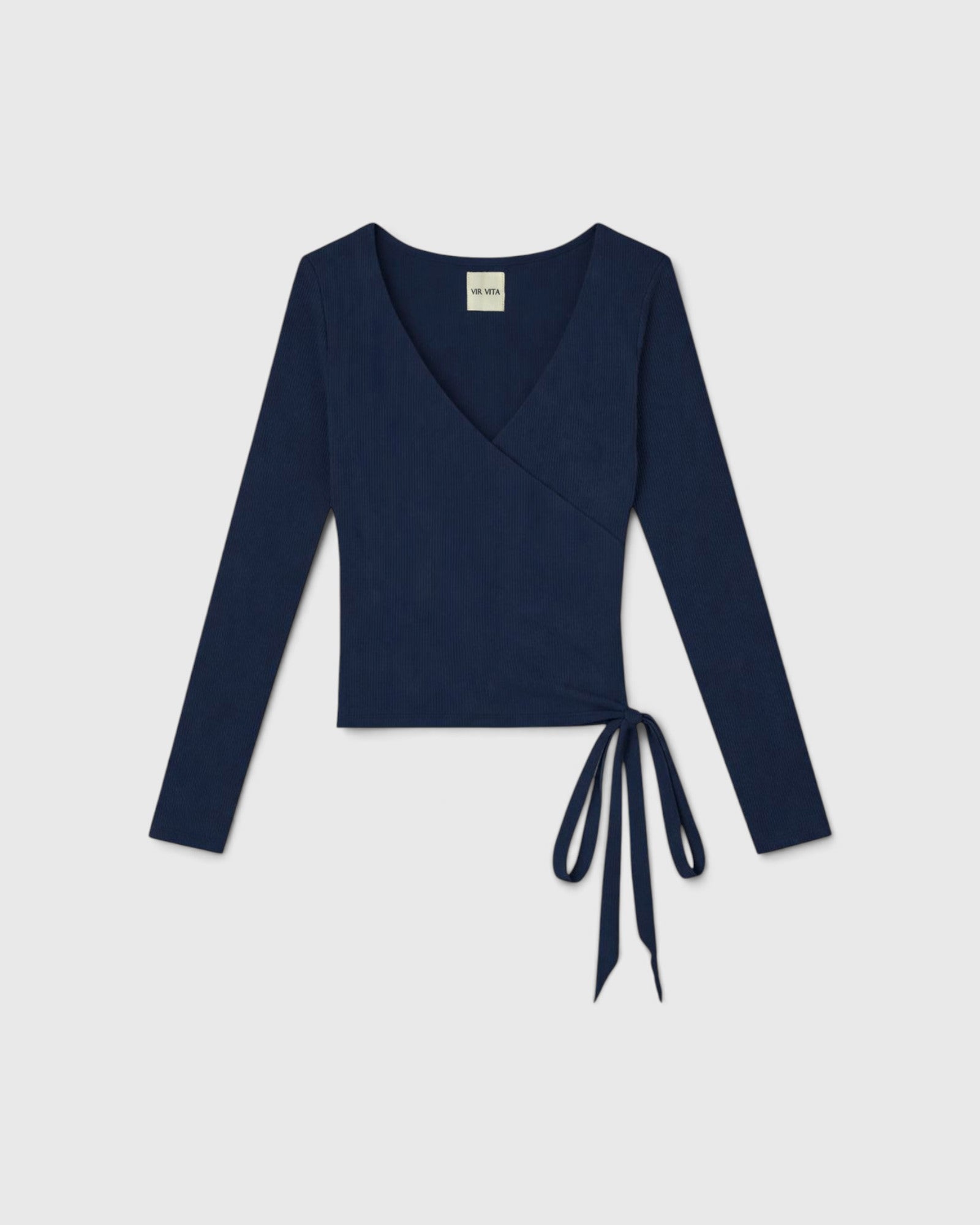 JONES + CO Margot wrap top in midnight blue ribbed knit with a V-neckline and side tie closure.