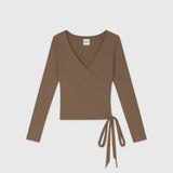 JONES + CO Margot wrap top in bark brown ribbed knit with long sleeves and a side tie closure.