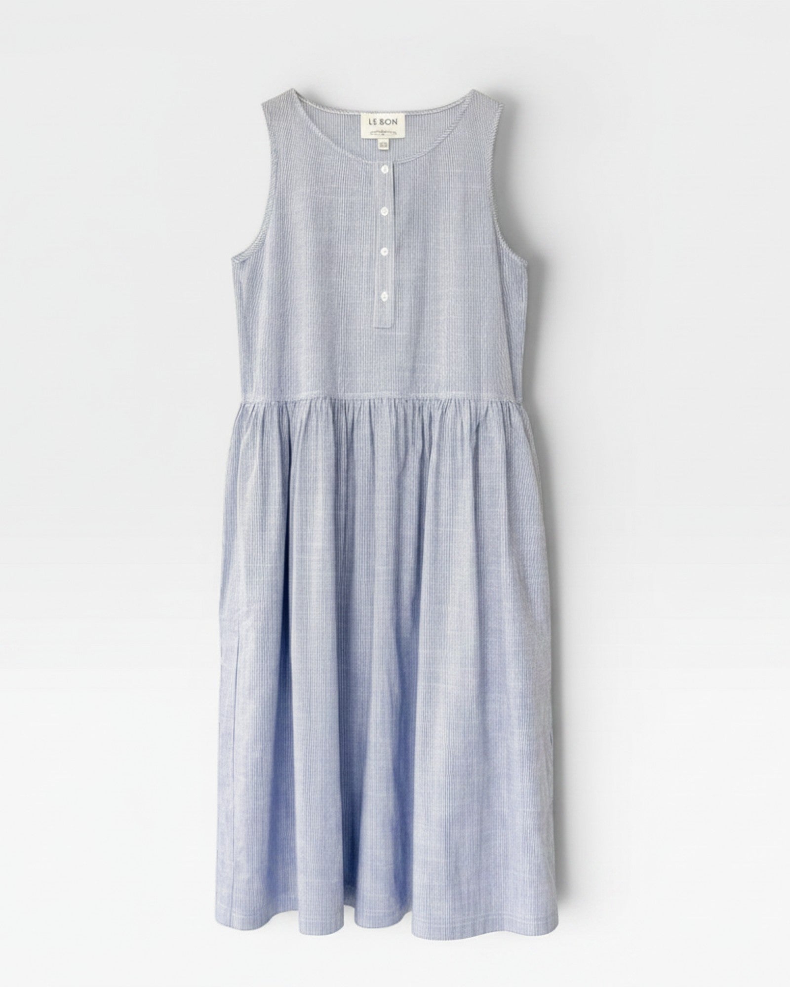 JONES + CO Marianne blue and white striped midi dress with half-button front and shirred skirt.