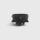 JONES + CO handthrown matte black ceramic Spike Bowl with sculptural spikes and three tapered feet