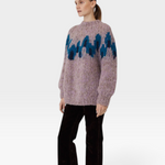 JONES + CO fleecy alpaca raglan pullover in lilac with a blue graphic intarsia pattern worn by a model