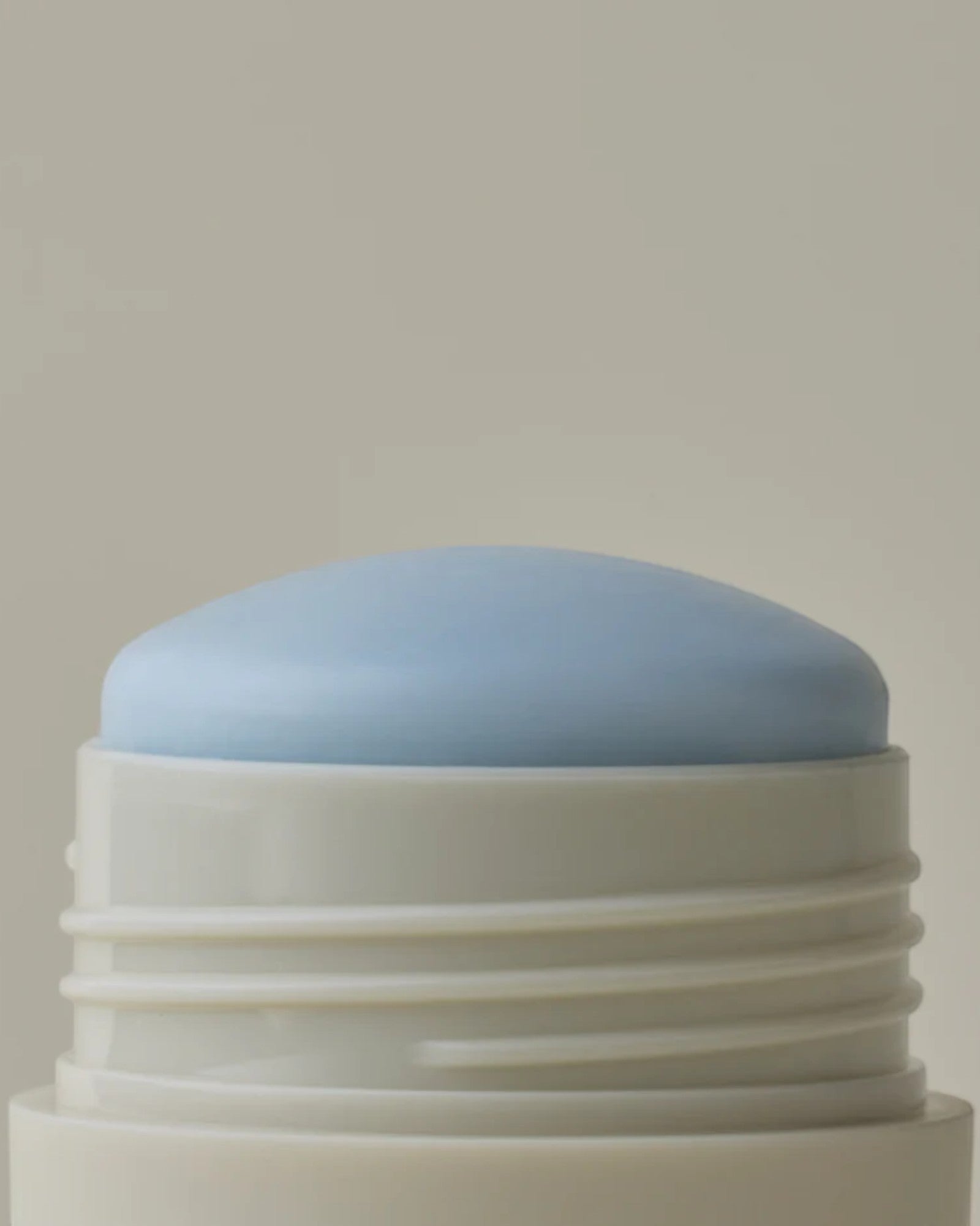 JONES + CO Microbiome Balancing Deodorant in light blue, aluminum-free formula in a twist-up tube.