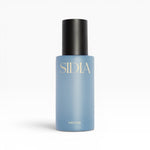 JONES + CO MIDAS Body Mist in a light blue bottle with a black cap, featuring gold lettering.